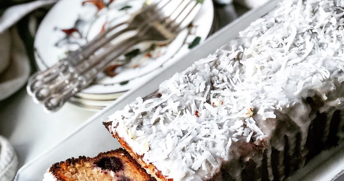 Honey Yogurt Pound Cake w/ Raspberries & Coconut Icing