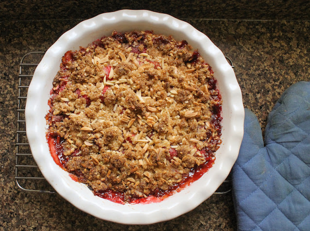 Food Lust People Love: Strawberry almond crumble pairs our favorite sweet red berries with a buttery almond oatmeal topping that also happens to be gluten-free. And since it's so quick and easy, this is the perfect dessert to make for your sweeties today for Valentine's Day.