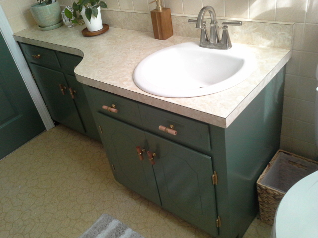 Vintage Bathroom Makeover green cabinets