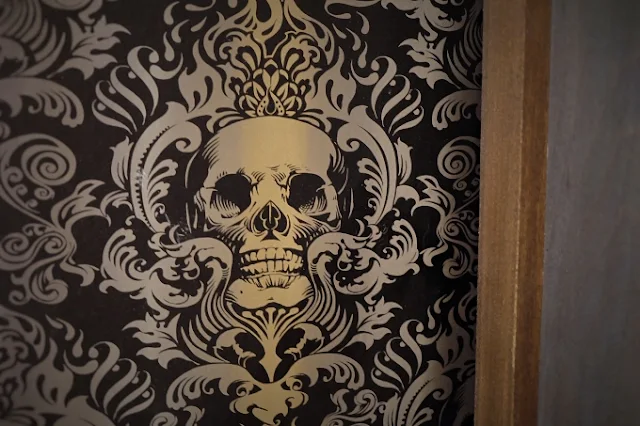 teaser of new bathroom skull wallpaper