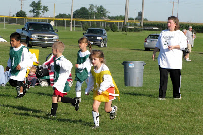 During this year's soccer season, I have discovered a very beautiful secret:  Pictures make people smile!  Are you a good photographer? Would you like to make a difference in the lives of young athletes?  I want to share with you a very simple way to share your gift with these young athletes that will keep on giving long after the last whistle/buzzer/horn sounds.