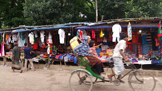 Street shops in the Korail Basti slum