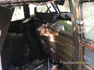 VW Kombi bulkhead that separates the front seating area from rear cargo/seat area.