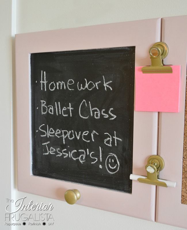 Blinged bulldog clips attached to reclaimed cabinet door chalkboard message board for a girl's room.