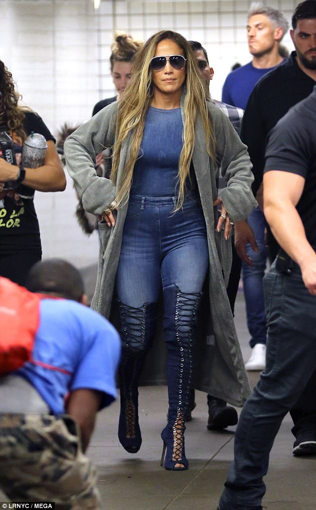 jumpsuit with thigh high boots