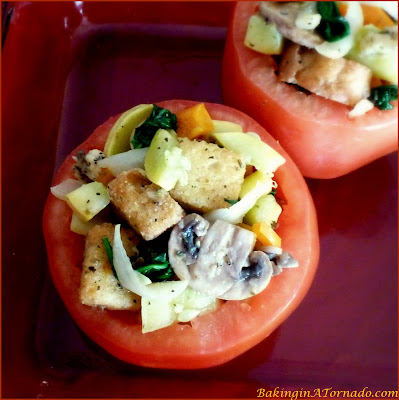 Bountiful Stuffed Tomatoes: filled with garden vegetables, parmesan and croutons, bursting with fresh flavor for a healthy lunch or side dish. | Recipe developed by www.BakingInATornado.com | #recipe #vegetables