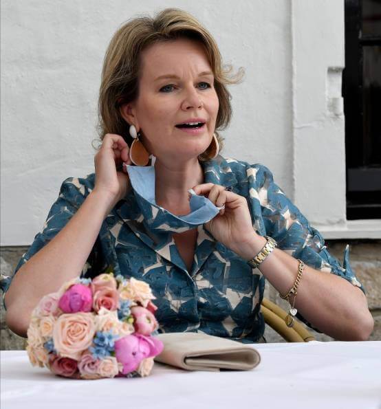 Queen Mathilde wore a new leaves printed floral half-long dress by Natan
