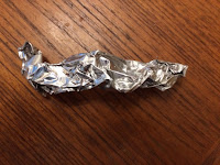 Foil tape remnant 