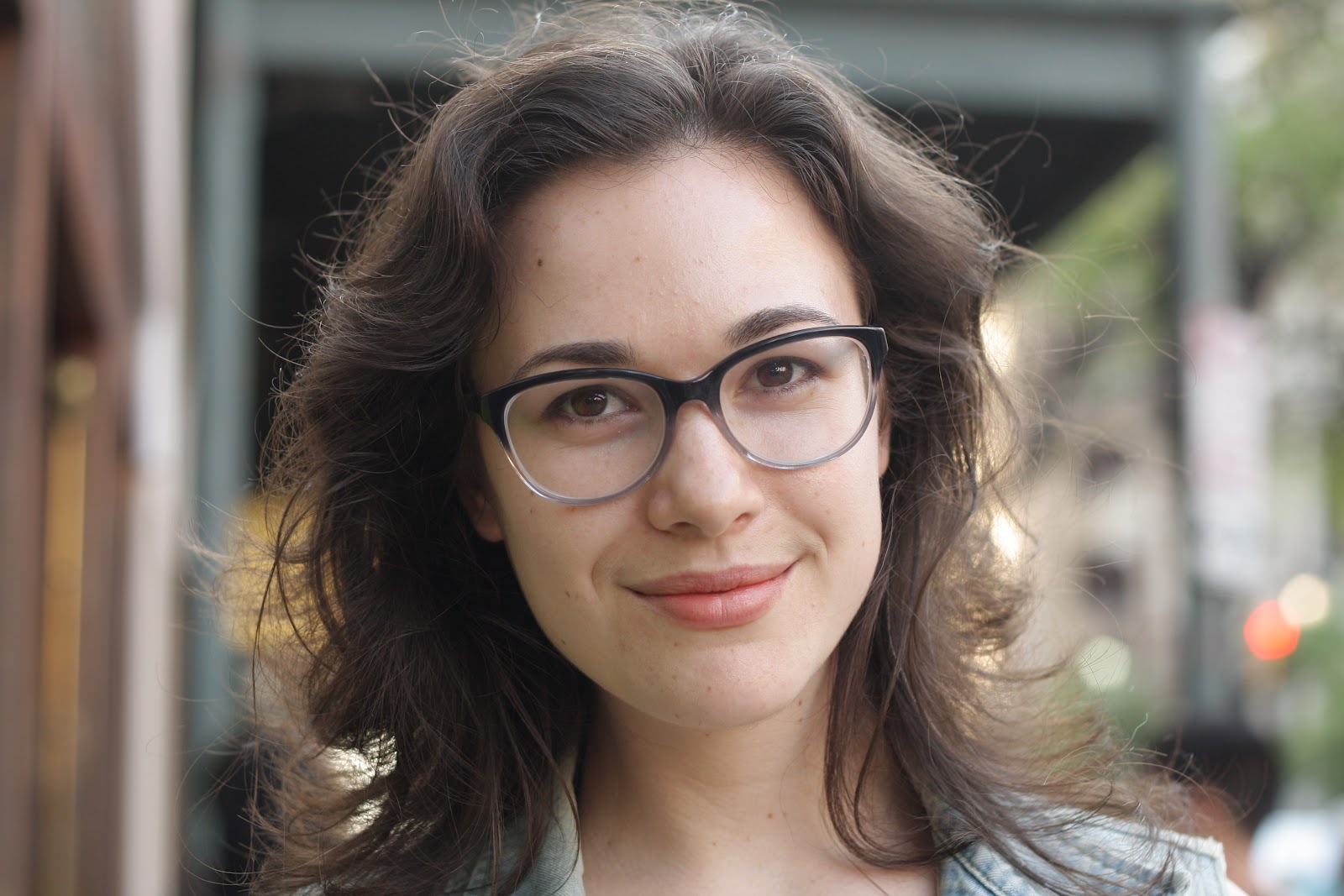 brunette girl with glasses