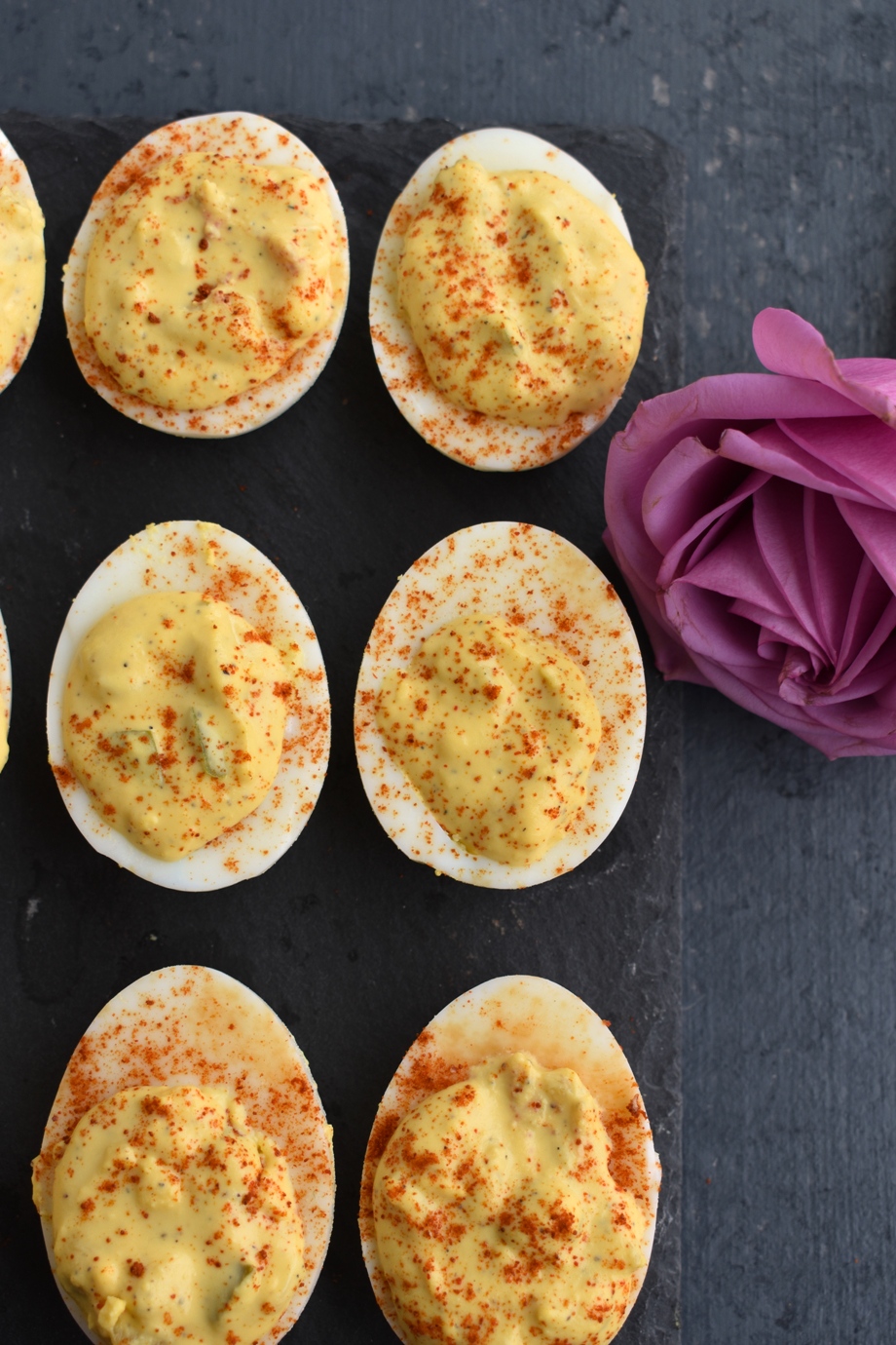 Healthy Deviled Eggs are super easy to make and loaded with flavor from dill pickles and mustard and use healthier ingredients for a lightened up deviled egg!