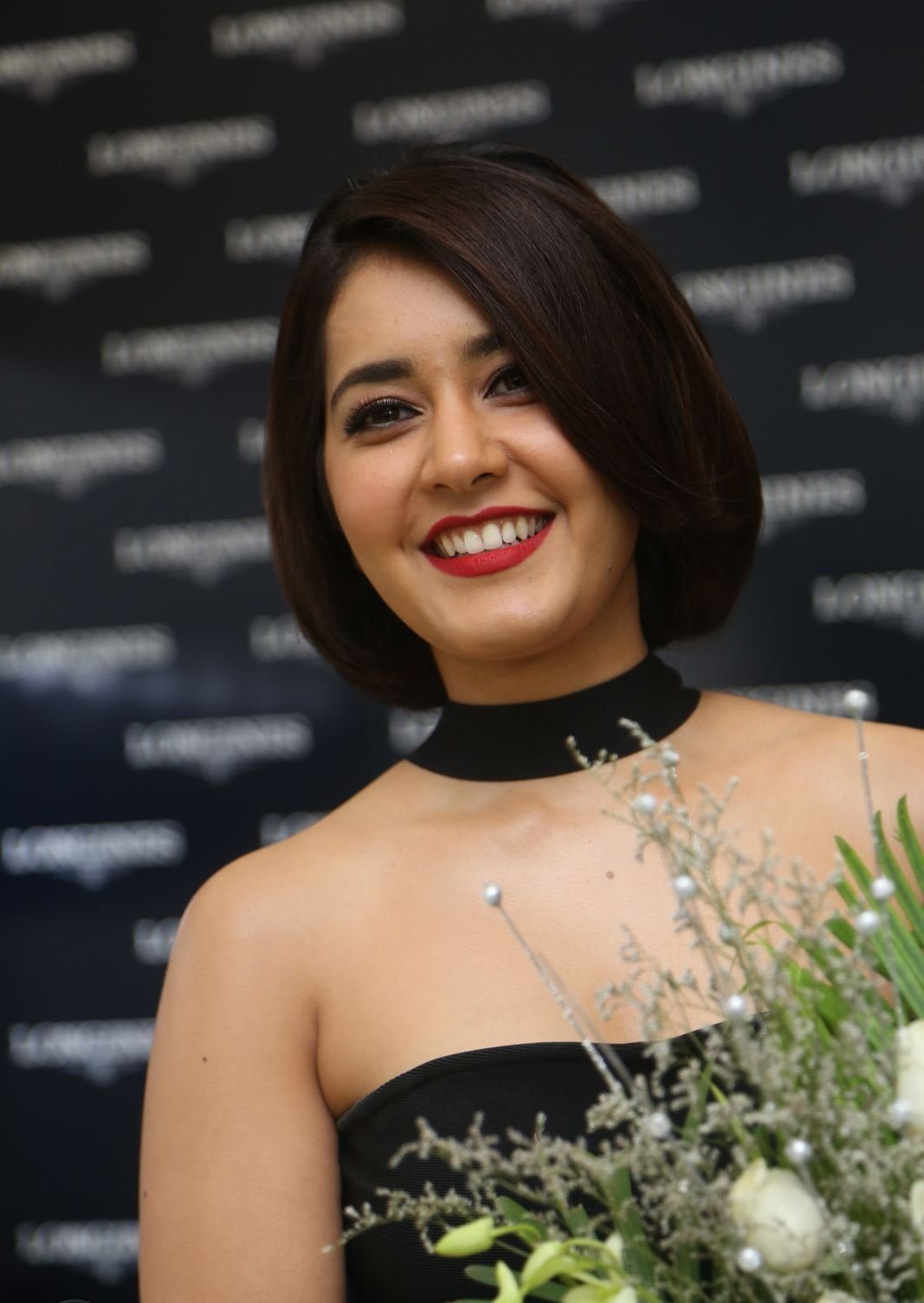 Raashi Khanna Looks Irresistibly Sexy In a Black Figure Hugging At The Launch Of Longines Watchesâ€™s Latest Collection In Jubilee Hills, Hyderabad