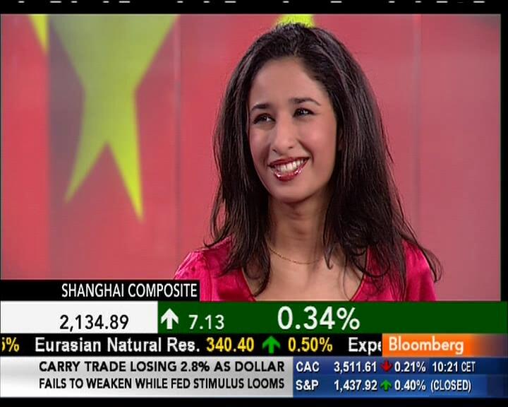 Ladies in Satin Blouses: Maryam Nemazee - reddish magenta satin top