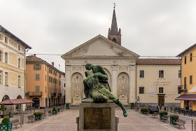 Piazza Sant'Agostino in Carmagnola. The town's war memorial is in the foreground