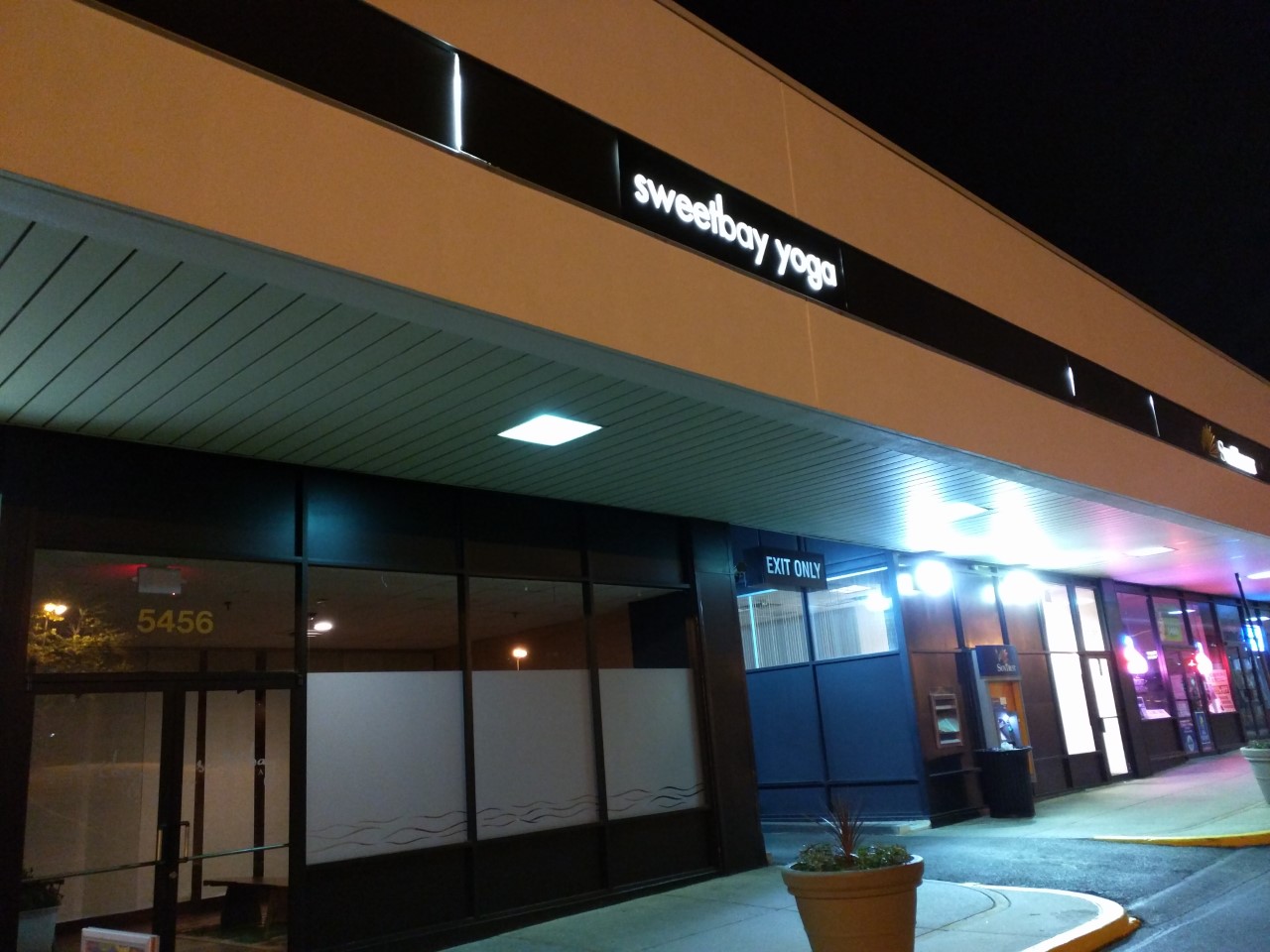 Robert Dyer Bethesda Row Sign installed at Sweetbay Yoga in Bethesda (Photos)