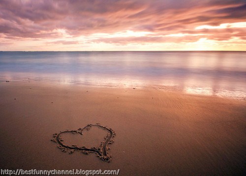 Heart on the beach sunset