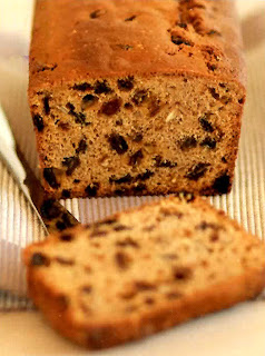 Fruited tea loaf: classic british cake of fruit soaked in tea that's sliced ready for serving