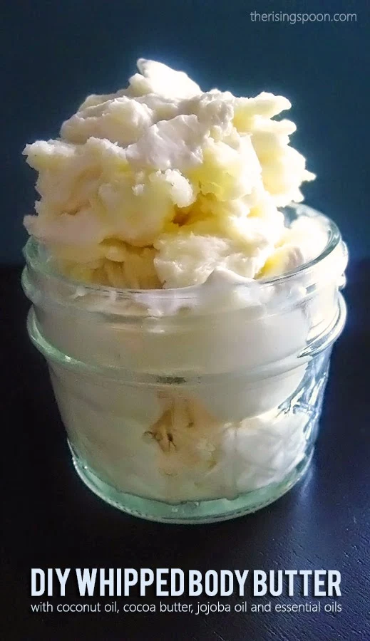 Learn how to make an easy, non-toxic whipped body butter recipe using coconut oil, cocoa butter, jojoba oil and essential oils. It will make you feel luxurious and moisturize your skin without putting a big dent in your wallet.