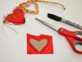 Tape on red cellophane to heart shaped glasses