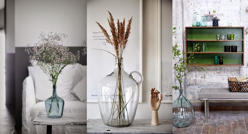 Garrafas de cristal como jarrones decorativos para el hogar