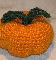 http://www.ravelry.com/patterns/library/crocheted-pumpkin-pincushion