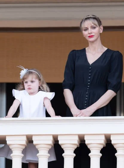Hereditary Prince Jacques and Princess Gabriella. Princess Charlene wore a new Brunello Cucinelli v-neck midi dress. Louis Vuitton dress