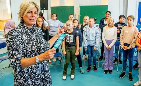 Princess Laurentien attended the launch of a new national education programme at primary school Het Avontuur in Almere. floral print silk dress