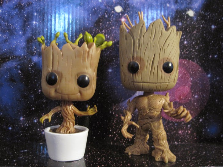 Funko Pop! Dancing Baby Groot and original Groot figures side by side.