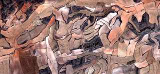 Spain fields from the air which mimic an abstract painting, artistic representation of human labor camps bird's eye view,abstract photograph surrealism,Abstract Naturalism,abstract expressionism