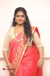 Actress Jayavani Stills in Red Saree at Intlo Deyyam Nakem Bhayam Trailer Launch  0001