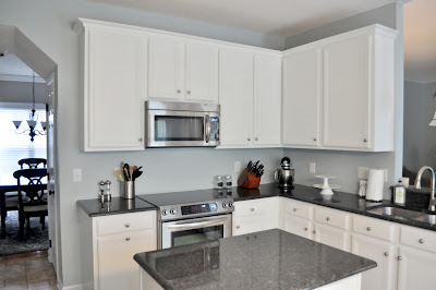 Steel Grey Granite Countertops With White Cabinets Kitchen