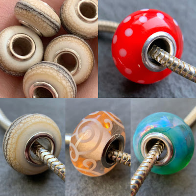 Handmade lampwork glass silver core charm beads by Laura Sparling