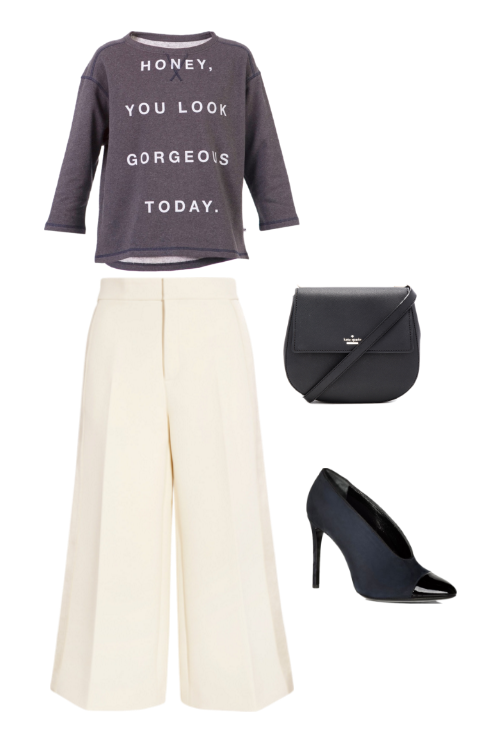 sudadera gris con mensaje, pantalón cropped de satén, salón abotinado con puntera de charon y bandolera negra