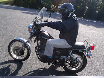 Carol and her two birthday presents (bike and helmet)