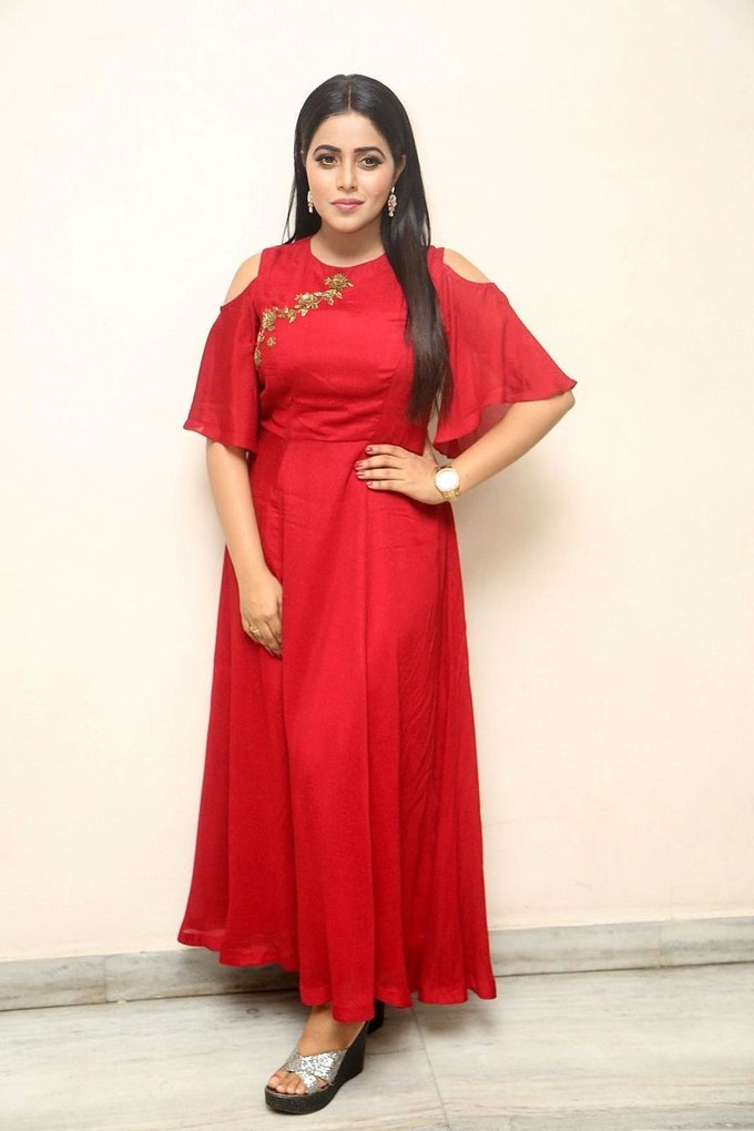Beautiful Telugu Girl Poorna Long Hair Stills In Red Dress