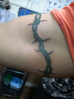 Barb wire tattoo designs,bicep tattoo designs for men