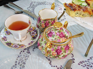 Tea is served with fine British bone china