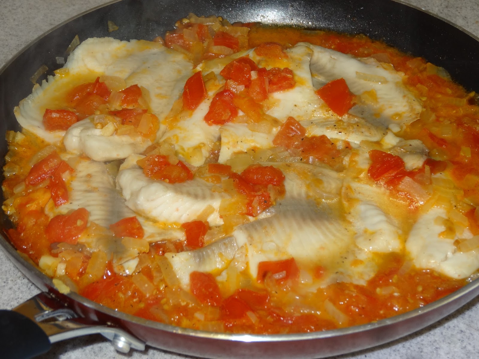 What's cookin', Mom? Tilapia Smothered in Onions and Tomatoes