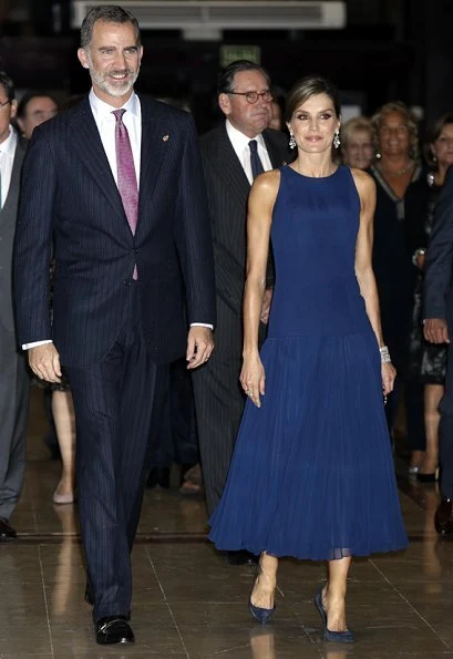 Queen Letizia Carolina Herrera top and skirt at Princess of Asturias Awards concert. white gold diamond earring