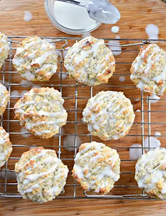 Lemon Poppy Seed Muffins drizzled with Lemon Glaze from Serena Bakes Simply From Scratch.