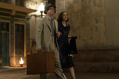 Photo of Marion Cotillard and Brad Pitt in the film Allied (2016) (45)