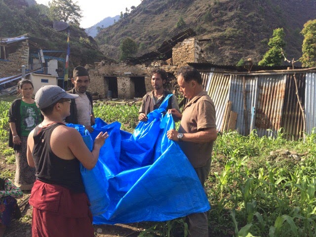 Donating tents to victims of earthquake in Yangri