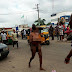 Prostitute Runs Mad In Owerri, Along Douglas Road, Strips Herself Unclad 