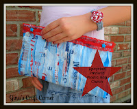 http://ginascraftcorner.blogspot.com/2013/06/upcycled-patriotic-clutch-made-from.html