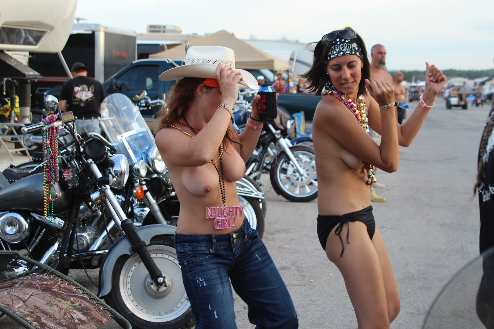 Topless biker women.