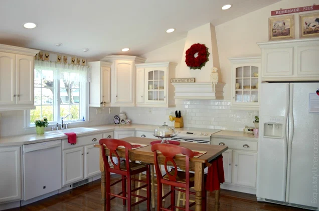 white kitchen with red accents