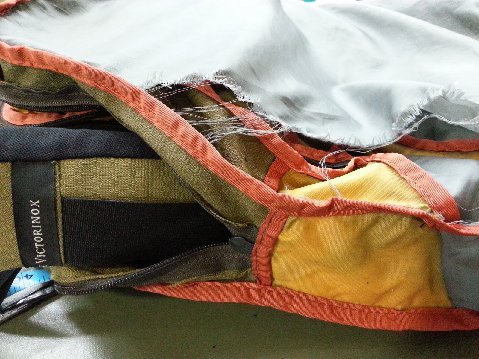 Victorinox bag repair, luggage wheel replacement, zipper, stitching