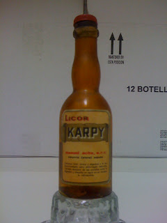 Botellines Juan Rivas Destilerías Acha · Licor de Naranja Karpy