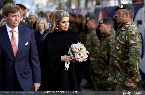 Dutch King Willem Alexander and Queen Maxima arrive at the Dutch 5th of May Liberation concert in Amsterdam on May 5, 2015