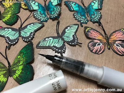 butterflies art journal page using stamps and other mixed media craft supplies