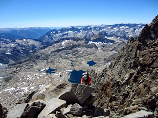 Jacquelyn almost at the summit of Polemonium Peak. Palisade Basin in the background.